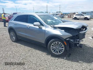 2024 Cadillac XT4 AWD Premium Luxury with VIN 1GYFZDR40RF141281, listed as a IAAI auction lot 42585681 with Not provided miles and . Bid and sale history available at DreamBid. Image 1.