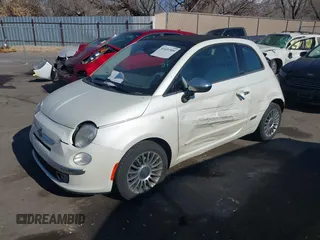 2012 FIAT 500 Lounge z VIN 3C3CFFER7CT119147, wystawiony jako IAAI lot #41431509 z przebiegiem 140 084 mil mil oraz . Historia ofert i sprzedaży dostępna na DreamBid. Obrazek 2.