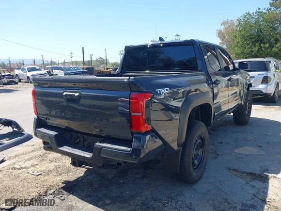 2024 Toyota Tacoma 4WD SR5 with VIN 3TMLB5JN4RM039036, listed as a IAAI auction lot 41813562 with 2,112 mi miles. Bid and sale history available at carsss.com. Image 4.