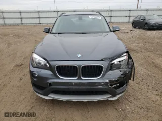 2015 BMW X1 xDrive28i with VIN WBAVL1C52FVY26870, listed as a Copart auction lot 43710555 with 0 mi miles and Salvage Title. Bid and sale history available at carsss.com. Image 5.