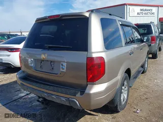 2004 Honda Pilot EX with VIN 2HKYF18574H578967, listed as a IAAI auction lot 41622715 with 150,803 mi miles. Bid and sale history available at carsss.com. Image 6.