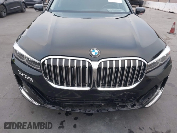 2022 BMW 7 Series 740i with VIN WBA7T2C0XNCJ31291, listed as a IAAI auction lot 40623307 with 98,877 mi miles. Bid and sale history available at carsss.com. Image 6.