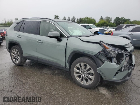 2021 Toyota RAV4 XLE Premium with VIN JTMA1RFV0MD074834, listed as a Copart auction lot 58466965 with 71,623 mi miles and Salvage title. Bid and sale history available at DreamBid. Image 4.