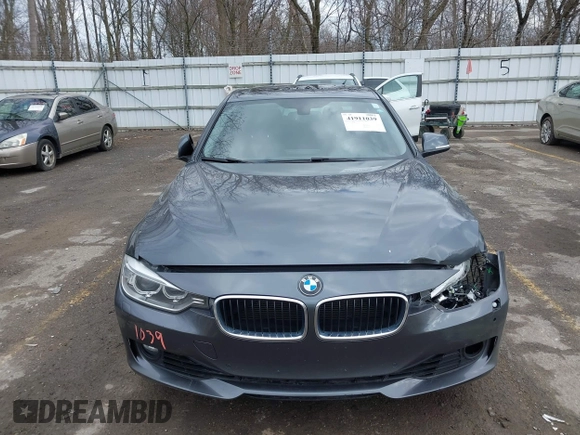 2014 BMW 3 Series 335i xDrive with VIN WBA3B9G59ENR91249, listed as a IAAI auction lot 41911039 with 97,597 mi miles and . Bid and sale history available at carsss.com. Image 12.