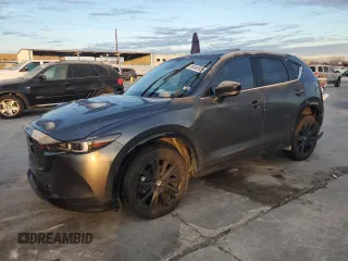 2022 Mazda CX-5 2.5 Turbo with VIN JM3KFBAY7N0647324, listed as a Copart auction lot 88488905 with 37,595 mi miles and Salvage Title. Bid and sale history available at carsss.com. Image 1.