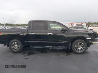 2021 Nissan Titan SV with VIN 1N6AA1EF4MN503458, listed as a IAAI auction lot 42401074 with 53,558 mi miles and . Bid and sale history available at DreamBid. Image 14.