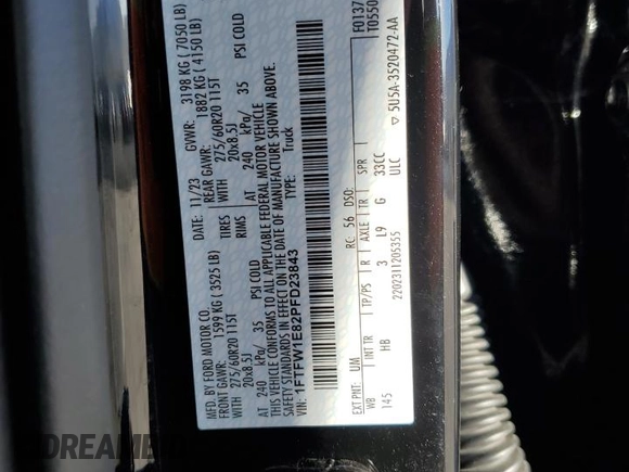 2023 Ford F-150 XL with VIN 1FTFW1E82PFD23843, listed as a Copart auction lot 49863045 with 21,721 mi miles and Salvage Title. Bid and sale history available at carsss.com. Image 12.