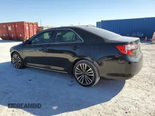 2014 Toyota Camry L with VIN 4T4BF1FK2ER376447, listed as a Copart auction lot 82886974 with 112,833 mi miles and Salvage Title. Bid and sale history available at DreamBid. Image 2.