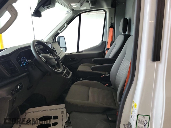 2023 Ford Transit Cargo with VIN 1FTBR1X86PKB99022, listed as a IAAI auction lot 42841650 with 14,234 mi miles and . Bid and sale history available at DreamBid. Image 4.