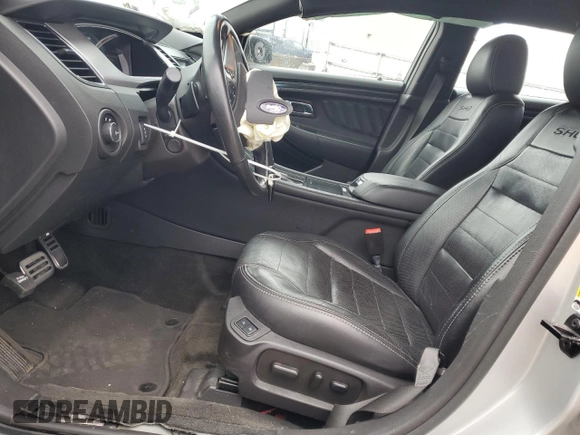 2018 Ford Taurus SHO с VIN 1FAHP2KT6JG127514, выставлен на аукционе Copart как лот 72861114 с пробегом 71 538 миль миль и Списание • Salvage title. История ставок и продаж доступна на DreamBid. Изображение 7.
