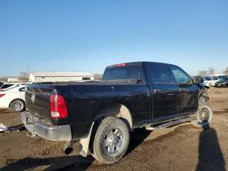 2014 Ram 2500 Tradesman with VIN 3C6UR5CLXEG105956, listed as a Copart auction lot 49177895 with 162,345 mi miles and Salvage Title. Bid and sale history available at carsss.com. Image 3.