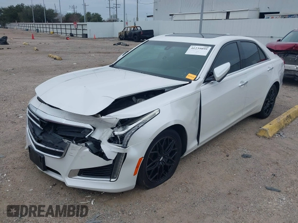 2019 Cadillac CTS RWD with VIN 1G6AP5SX0K0121219, listed as a IAAI auction lot 41239899 with 84,588 mi miles and . Bid and sale history available at DreamBid. Image 2.