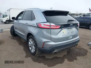 2020 Ford Edge Titanium z VIN 2FMPK4K95LBA16379, wystawiony jako IAAI lot #41190704 z przebiegiem 69 076 mil mil oraz . Historia ofert i sprzedaży dostępna na DreamBid. Obrazek 3.