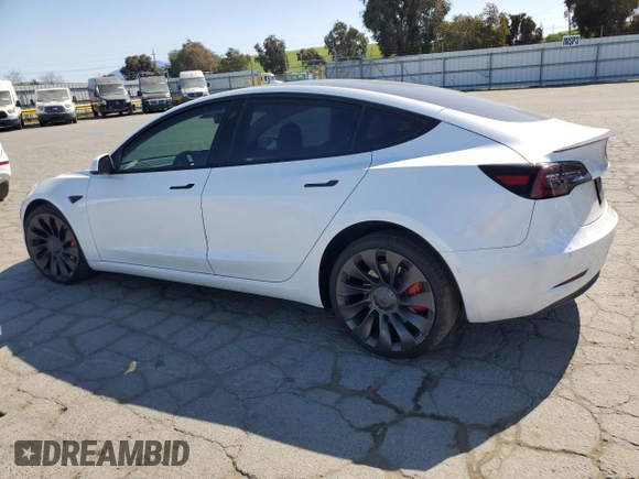 2021 Tesla Model 3 Performance with VIN 5YJ3E1EC5MF077493, listed as a Copart auction lot 48067045 with 44,285 mi miles and Salvage Title. Bid and sale history available at DreamBid. Image 2.