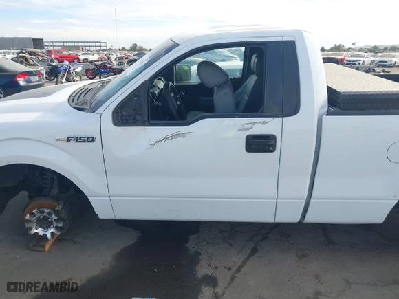 2014 Ford F-150 XL with VIN 1FTMF1CM3EKG36797, listed as a IAAI auction lot 40892574 with 136,417 mi miles. Bid and sale history available at carsss.com. Image 13.