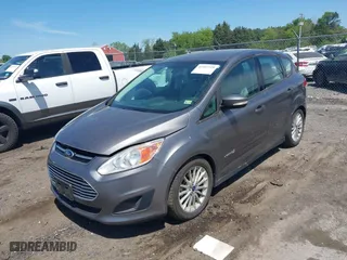 2013 Ford C-Max Hybrid SE with VIN 1FADP5AU7DL550589, listed as a IAAI auction lot 42107729 with 114,796 mi miles. Bid and sale history available at carsss.com. Image 2.