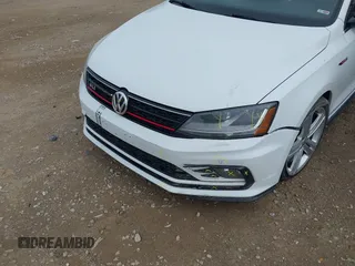 2017 Volkswagen Jetta GLI z VIN 3VW4T7AJ8HM349440, wystawiony jako IAAI lot #42491919 z przebiegiem 141 764 mil mil oraz . Historia ofert i sprzedaży dostępna na DreamBid. Obrazek 6.