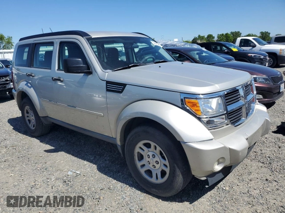 2009 Dodge Nitro SE z VIN 1D8GT28K19W541402, wystawiony jako Copart lot #57487874 z przebiegiem 189 653 mil mil oraz Szkoda całkowita • Salvage title. Historia ofert i sprzedaży dostępna na DreamBid. Obrazek 4.