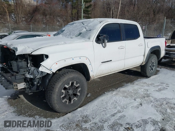 2019 Toyota Tacoma SR z VIN 5TFCZ5AN9KX178090, wystawiony jako IAAI lot #41155337 z przebiegiem 115 265 mil mil oraz . Historia ofert i sprzedaży dostępna na DreamBid. Obrazek 2.