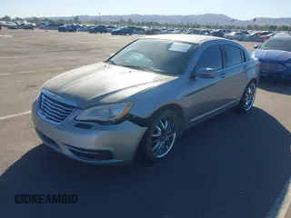2014 Chrysler 200 LX with VIN 1C3CCBAB3EN210784, listed as a IAAI auction lot 40809915 with 177,513 mi miles. Bid and sale history available at carsss.com. Image 2.