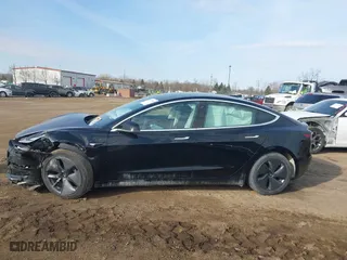 2019 Tesla Model 3 Long Range with VIN 5YJ3E1EB5KF414748, listed as a IAAI auction lot 41778914 with 0 mi miles. Bid and sale history available at carsss.com. Image 14.