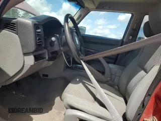 2006 Jeep Commander with VIN 1J8HH48KX6C203308, listed as a Copart auction lot 64456765 with 185,794 mi miles and Salvage title. Bid and sale history available at DreamBid. Image 7.