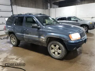 2001 Jeep Grand Cherokee Limited with VIN 1J4GW58N01C664996, listed as a Copart auction lot 58339825 with 288,153 mi miles and Salvage title. Bid and sale history available at DreamBid. Image 4.