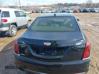 2017 Cadillac CT6 Platinum AWD z VIN 1G6KN5R64HU175275, wystawiony jako IAAI lot #41683802 z przebiegiem 75 604 mil mil oraz . Historia ofert i sprzedaży dostępna na DreamBid. Obrazek 16.