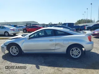 2003 Toyota Celica GT with VIN JTDDR32T330164010, listed as a IAAI auction lot 41680196 with 188,938 mi miles. Bid and sale history available at carsss.com. Image 13.
