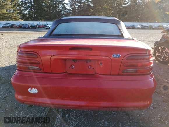 1995 Ford Mustang with VIN 1FALP4449SF205979, listed as a Copart auction lot 79690704 with 100,257 mi miles and Clean title. Bid and sale history available at DreamBid. Image 6.