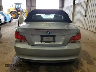2011 BMW 1 Series 128i with VIN WBAUL7C57BVM80274, listed as a Copart auction lot 52127595 with 104,952 mi miles and Salvage title. Bid and sale history available at DreamBid. Image 6.