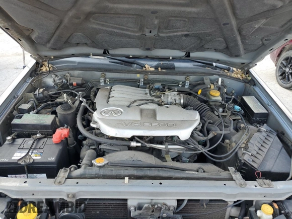 2001 Infiniti QX4 z VIN JNRDR09X61W204050, wystawiony jako Copart lot #78048074 z przebiegiem Nie podano mil oraz Szkody całkowita. Historia ofert i sprzedaży dostępna na DreamBid. Obrazek 11.