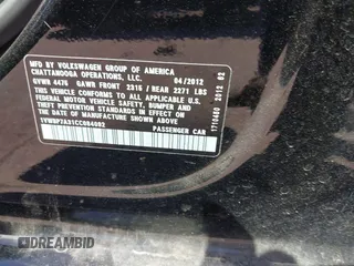2012 Volkswagen Passat SE with VIN 1VWBP7A31CC084092, listed as a IAAI auction lot 41855831 with 91,252 mi miles. Bid and sale history available at carsss.com. Image 9.