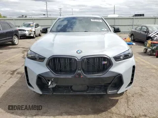 2025 BMW X6 M60i with VIN 5UX43EX06S9W68023, listed as a Copart auction lot 69874764 with 3,789 mi miles and Salvage Title. Bid and sale history available at carsss.com. Image 5.