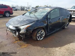 2018 Toyota Prius Two with VIN JTDKARFU7J3062094, listed as a IAAI auction lot 41648271 with 116,260 mi miles. Bid and sale history available at carsss.com. Image 2.