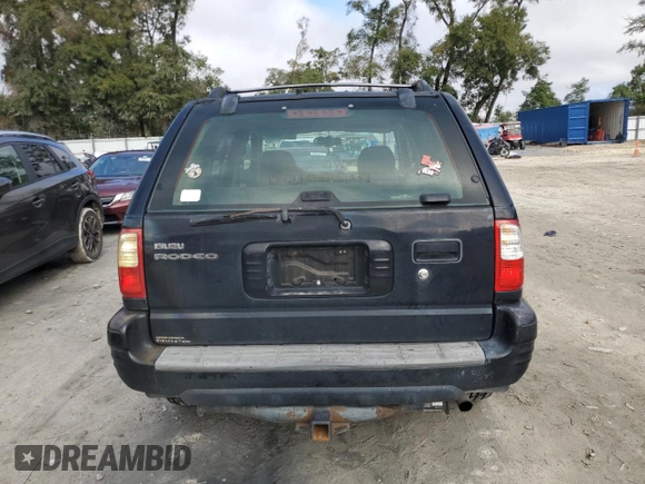 2001 Isuzu Rodeo S with VIN 4S2CK58W214338866, listed as a Copart auction lot 85280494 with 57,279 mi miles and Clean title. Bid and sale history available at DreamBid. Image 6.
