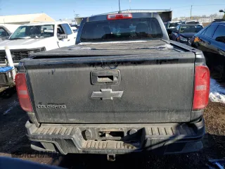 2015 Chevrolet Colorado 4WD WT with VIN 1GCGTAE32F1191129, listed as a Copart auction lot 42255765 with 106,516 mi miles and Salvage Title. Bid and sale history available at DreamBid. Image 6.