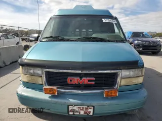 1995 GMC Safari z VIN 1GDDM19W2SB525888, wystawiony jako Copart lot #81358954 z przebiegiem 121 066 mil mil oraz Szkody całkowita. Historia ofert i sprzedaży dostępna na DreamBid. Obrazek 5.