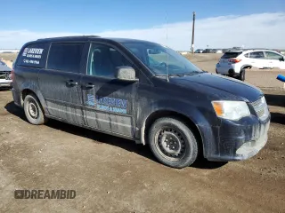 2011 Dodge Grand Caravan SXT with VIN 2D4RN4DG6BR748061, listed as a Copart auction lot 49673385 with 187,129 mi miles and Salvage Title. Bid and sale history available at DreamBid. Image 4.