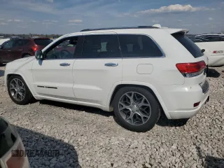 2020 Jeep Grand Cherokee Overland with VIN 1C4RJFCG4LC398526, listed as a Copart auction lot 54221205 with 122,046 mi miles and Salvage Title. Bid and sale history available at DreamBid. Image 2.