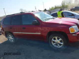 2006 GMC Envoy SLT with VIN 1GKDT13S662189377, listed as a IAAI auction lot 42106602 with 156,391 mi miles and . Bid and sale history available at DreamBid. Image 13.