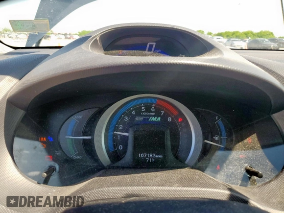 2010 Honda Insight LX with VIN JHMZE2H56AS042097, listed as a Copart auction lot 53972215 with 107,182 mi miles and Salvage Title. Bid and sale history available at DreamBid. Image 9.