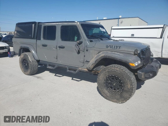 2022 Jeep Gladiator Texas Trail with VIN 1C6HJTAG8NL103449, listed as a Copart auction lot 49823595 with 60,902 mi miles and Salvage Title. Bid and sale history available at carsss.com. Image 4.