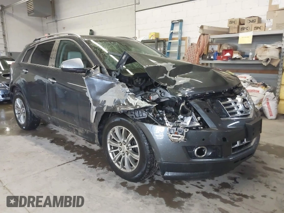 2013 Cadillac SRX Performance Collection with VIN 3GYFNHE37DS530908, listed as a IAAI auction lot 41662796 with 80,254 mi miles. Bid and sale history available at carsss.com. Image 1.