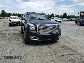 2017 GMC Yukon Denali with VIN 1GKS2CKJ3HR360319, listed as a Copart auction lot 70051014 with 127,896 mi miles and Salvage Title. Bid and sale history available at carsss.com. Image 12.