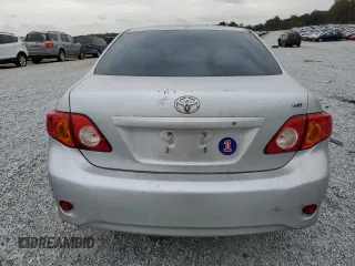 2009 Toyota Corolla with VIN JTDBL40E79J049125, listed as a Copart auction lot 79130204 with 203,856 mi miles and Salvage Title. Bid and sale history available at carsss.com. Image 6.