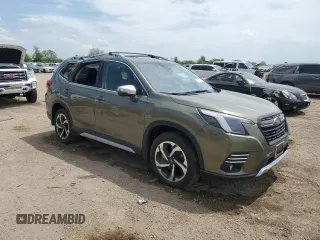 2024 Subaru Forester Touring with VIN JF2SKAMC7RH419587, listed as a Copart auction lot 57151525 with 8,830 mi miles and Salvage title. Bid and sale history available at DreamBid. Image 4.