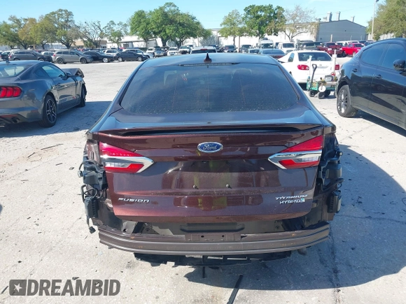 2019 Ford Fusion Hybrid Titanium with VIN 3FA6P0RU2KR123786, listed as a IAAI auction lot 41857026 with 49,604 mi miles. Bid and sale history available at carsss.com. Image 17.