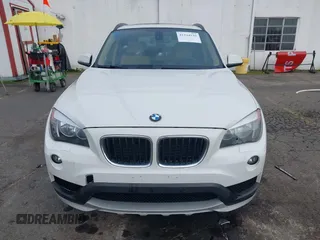 2015 BMW X1 xDrive28i z VIN WBAVL1C54FVY38101, wystawiony jako IAAI lot #41344120 z przebiegiem 130 000 mil mil oraz . Historia ofert i sprzedaży dostępna na DreamBid. Obrazek 11.