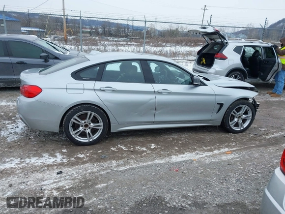 2016 BMW 4 Series 428i xDrive with VIN WBA4C9C53GG136870, listed as a IAAI auction lot 41410071 with 116,187 mi miles and . Bid and sale history available at DreamBid. Image 13.